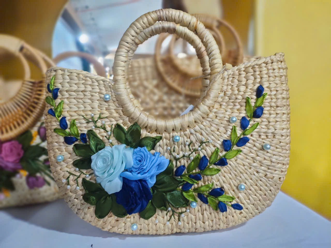 Handmade Water Hyacinth Tote Bag with Blue Ribbon Embroidery – Floral Woven Straw Handbag for Women