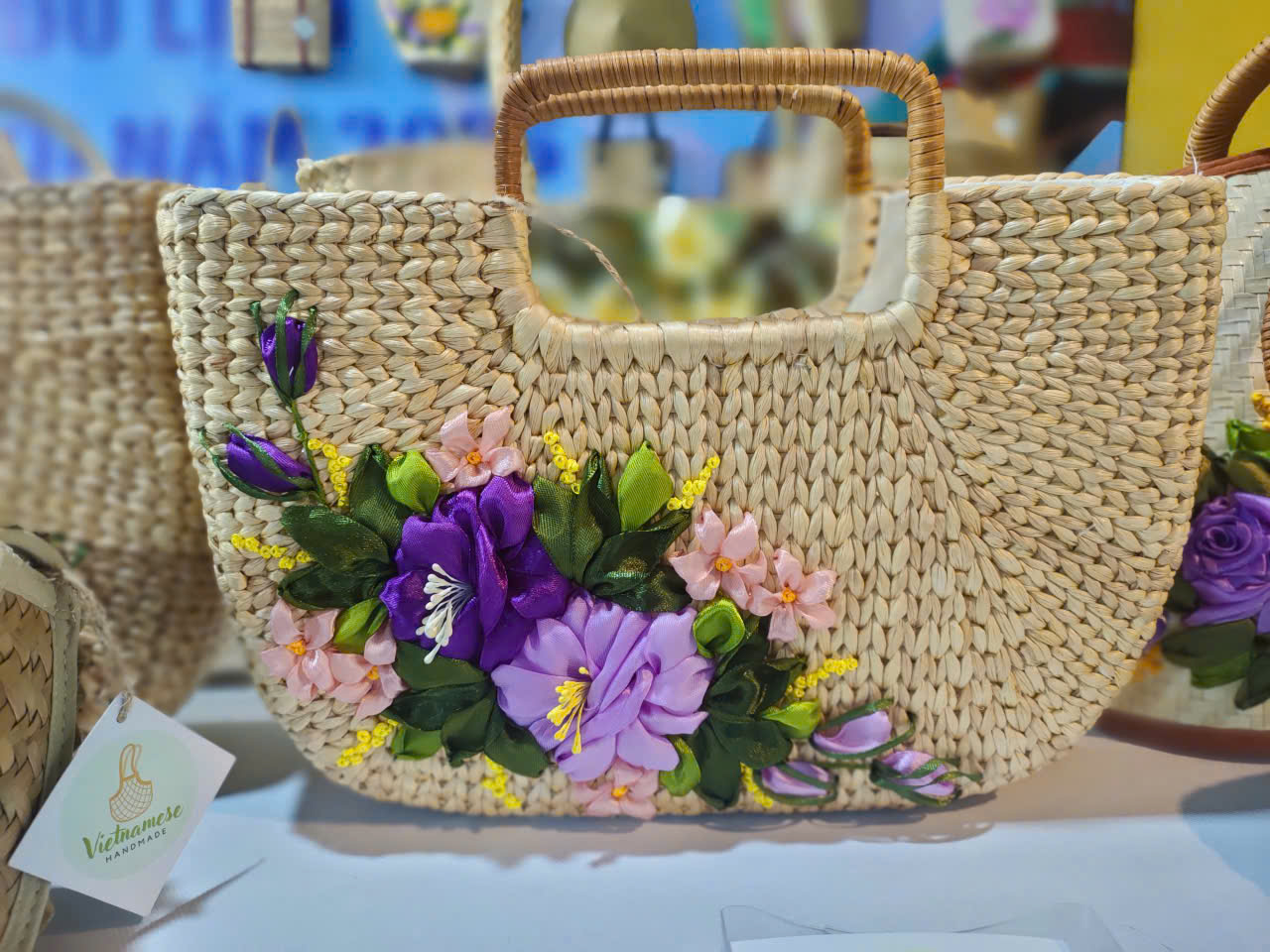 Handmade Water Hyacinth Tote Bag with Purple Ribbon Embroidery – Woven Floral Straw Handbag for Women